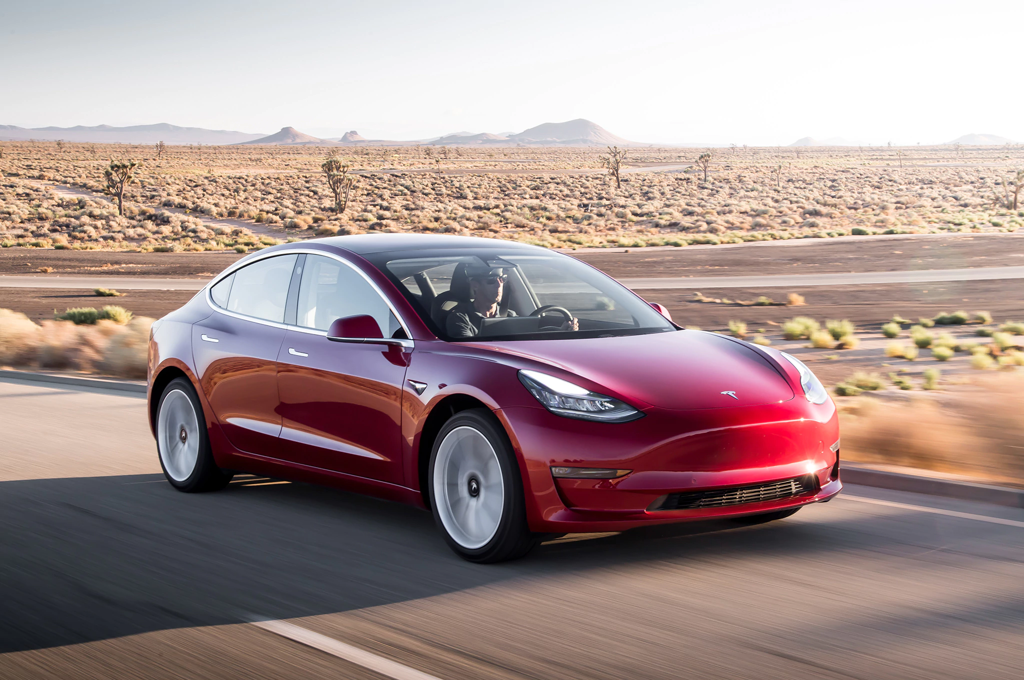 2017-Tesla-Model-3-front-three-quarter-in-motion-01.jpg